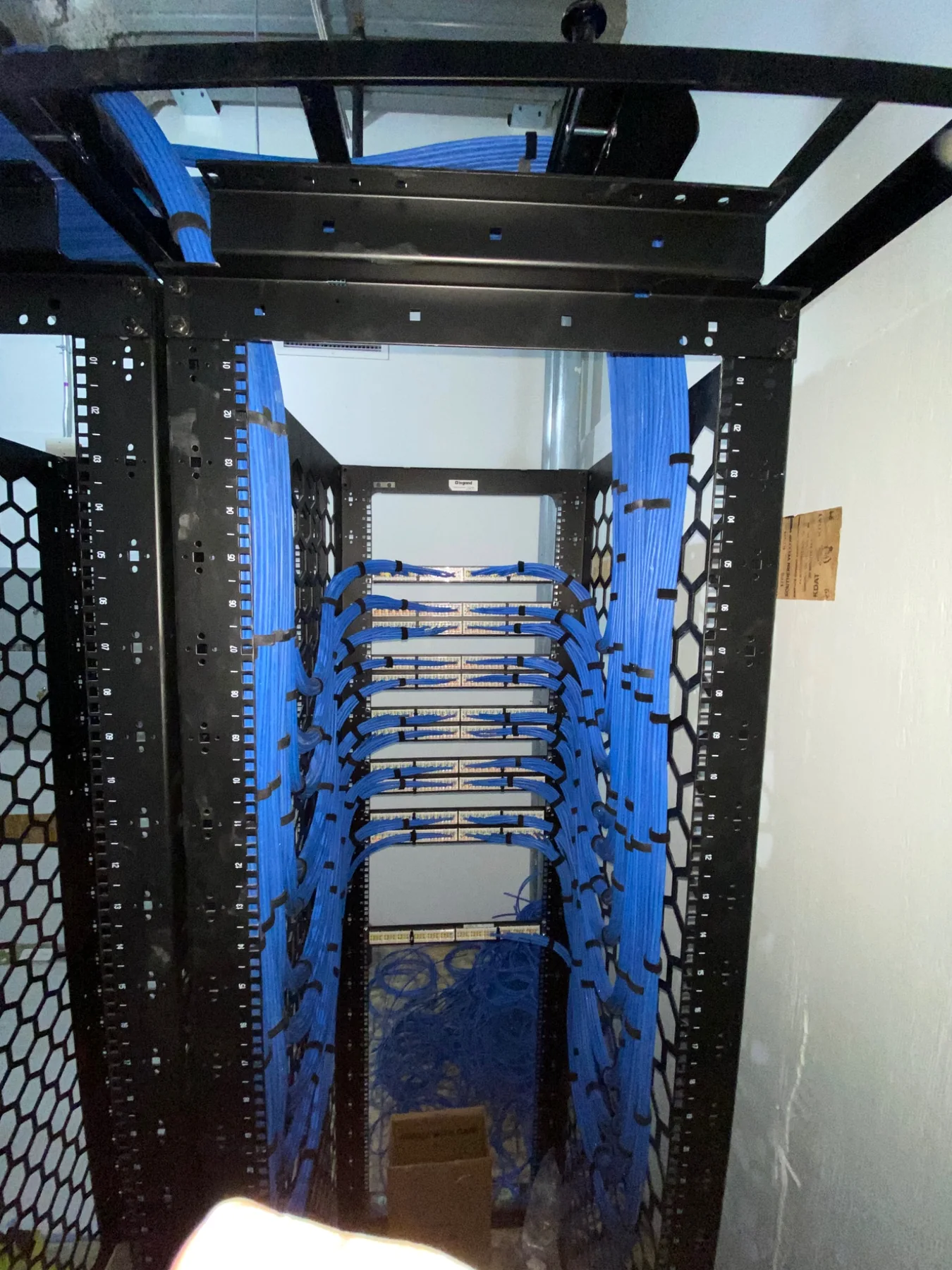 Large blue structured cabling bundles