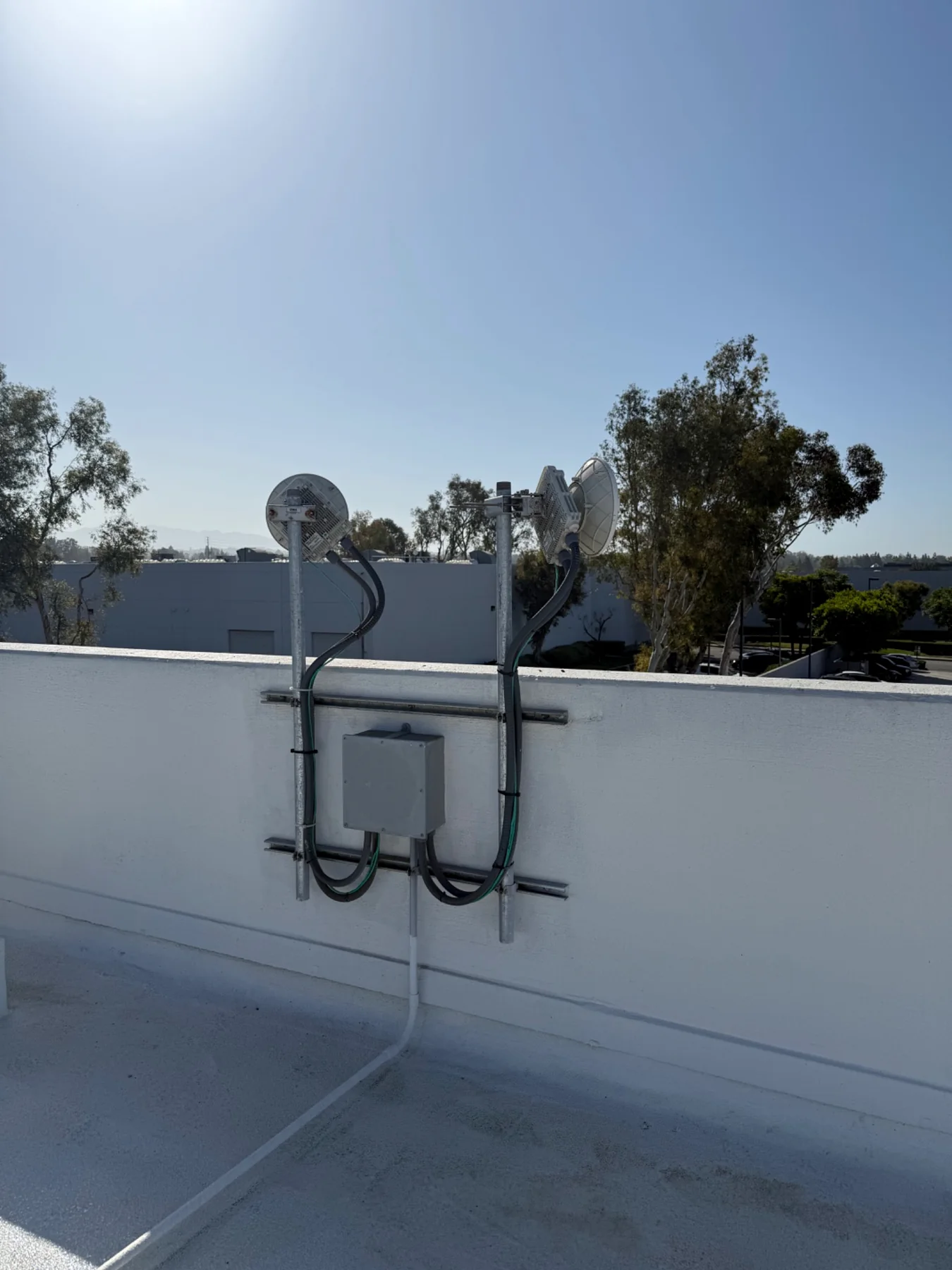Wireless antennas installed for a building-to-building link