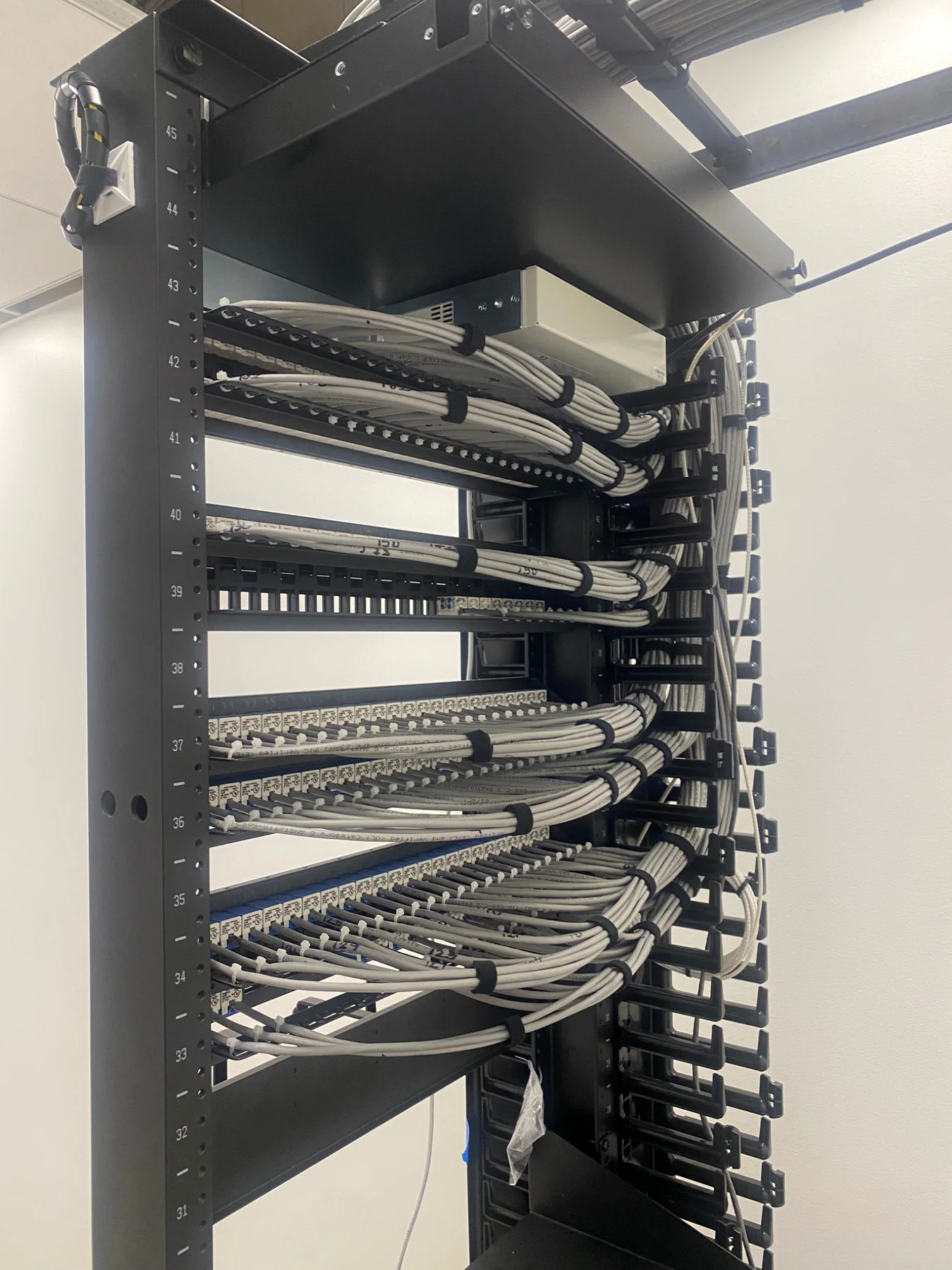 Rear cable management on a network rack